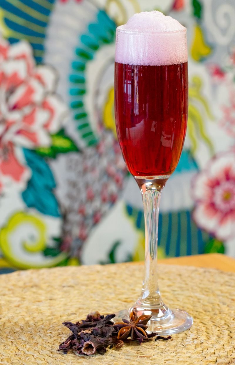 The hibiscus mimosa served at Belle & Lily's Caribbean Brunch House starts with sorrel, a tea brewed from dried hibiscus flowers and spices. Ryan Fleisher for The Atlanta Journal-Constitution