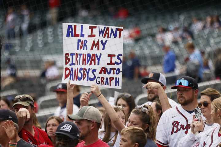 A Braves fan had a special request before the second game of the series between the Atlanta Braves and the New York Mets at Truist Park on Saturday, Oct. 1, 2022. Miguel Martinez / miguel.martinezjimenez@ajc.com 