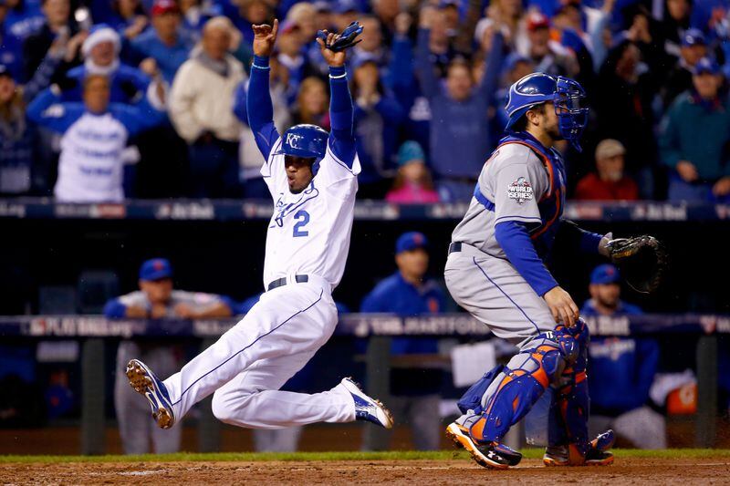 Alcides Escobar #2 of the Kansas City Royals scores a run on a two-run RBI single hit by Eric Hosmer #35 of the Kansas City Royals (not pictured) in the fifth inning against the New York Mets in Game Two of the 2015 World Series. (Photo by Jamie Squire/Getty Images)