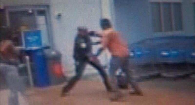 Video surveillance from a Walmart shows an off-duty police officer beating a customer. (Credit: Channel 2 Action News)