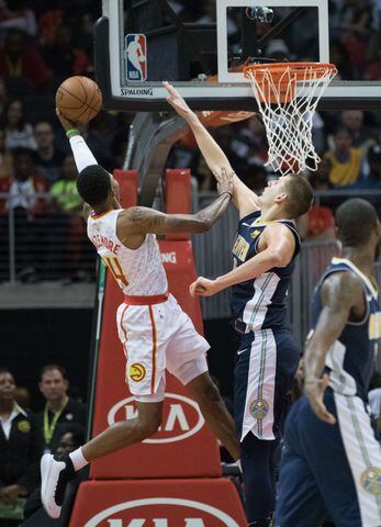 Photos: Hawks drop home opener at renovated Philips Arena