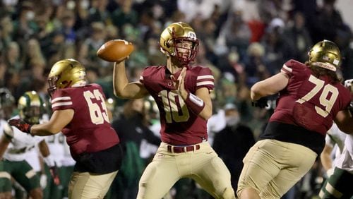 Brookwood quarterback Jack Spyke (10) attempts a pass in the first half of Friday's game against Grayson.