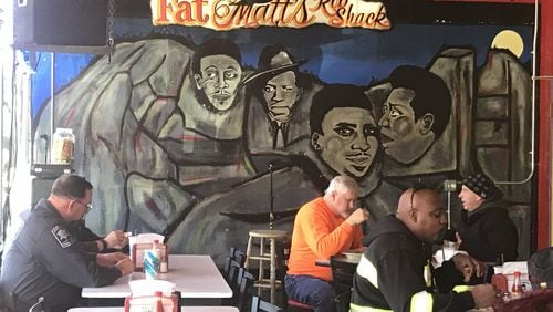 At Fat Matt’s Rib Shack on Piedmont Avenue in Atlanta, live blues is as much a draw as the smoked meat. LIGAYA FIGUERAS / LFIGUERAS@AJC.COM