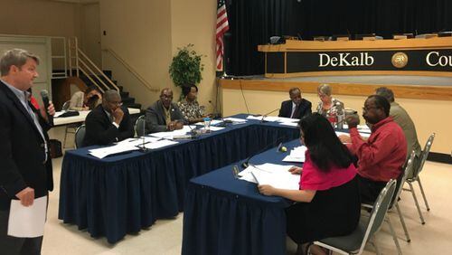 The DeKalb Board of Commissioners discussed road repairs and other projects that could be funded with a 1 percent sales tax increase at Maloof Auditorium in Decatur on Thursday, July 20, 2017. From left: Deputy Chief Operating Officer Ted Rhinehart, Chief Operating Officer Zach Williams, Commissioner Greg Adams, Intergovernmental Affairs Manager Delores Crowell, CEO Mike Thurmond, Commissioner Nancy Jester, Commissioner Kathie Gannon, Commissioner Steve Bradshaw and Commissioner Jeff Rader. MARK NIESSE / MARK.NIESSE@AJC.COM