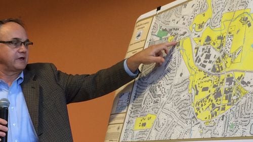 DeKalb County Commissioner Jeff Rader outlines what he knows about Emory University’s move to annex into Atlanta. Photo by Bill Torpy