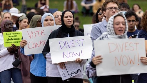 Protesters at various Georgia campuses, including Emory University, have called for their schools to cut financial ties to Israel. (Arvin Temkar / AJC)