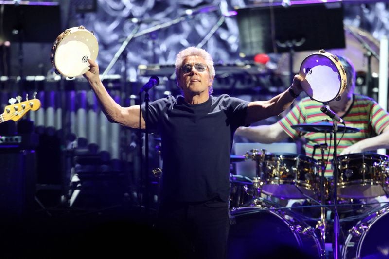 The Who's Roger Daltrey double fists tambourines during "1921," which the band played early in its Sept. 18 show at State Farm Arena.