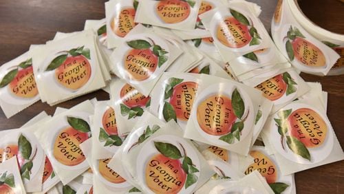 Georgia voting stickers. HYOSUB SHIN / HSHIN@AJC.COM