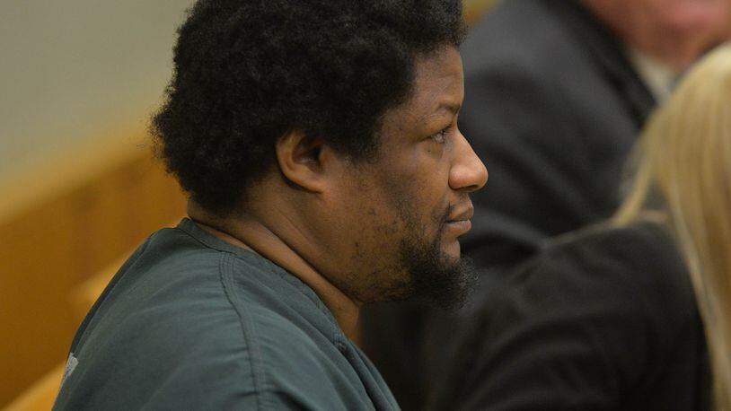 Calvin Mcintosh listens in this December 2014 photo as Chief Magistrate Kristina Hammer Blum binds him over for trial during a hearing for him and his daughter, Najlaa McIntosh, who are charged with starving his child to death and withholding food from the child's 21-year-old mother, who weighed 59 pounds when she was found.