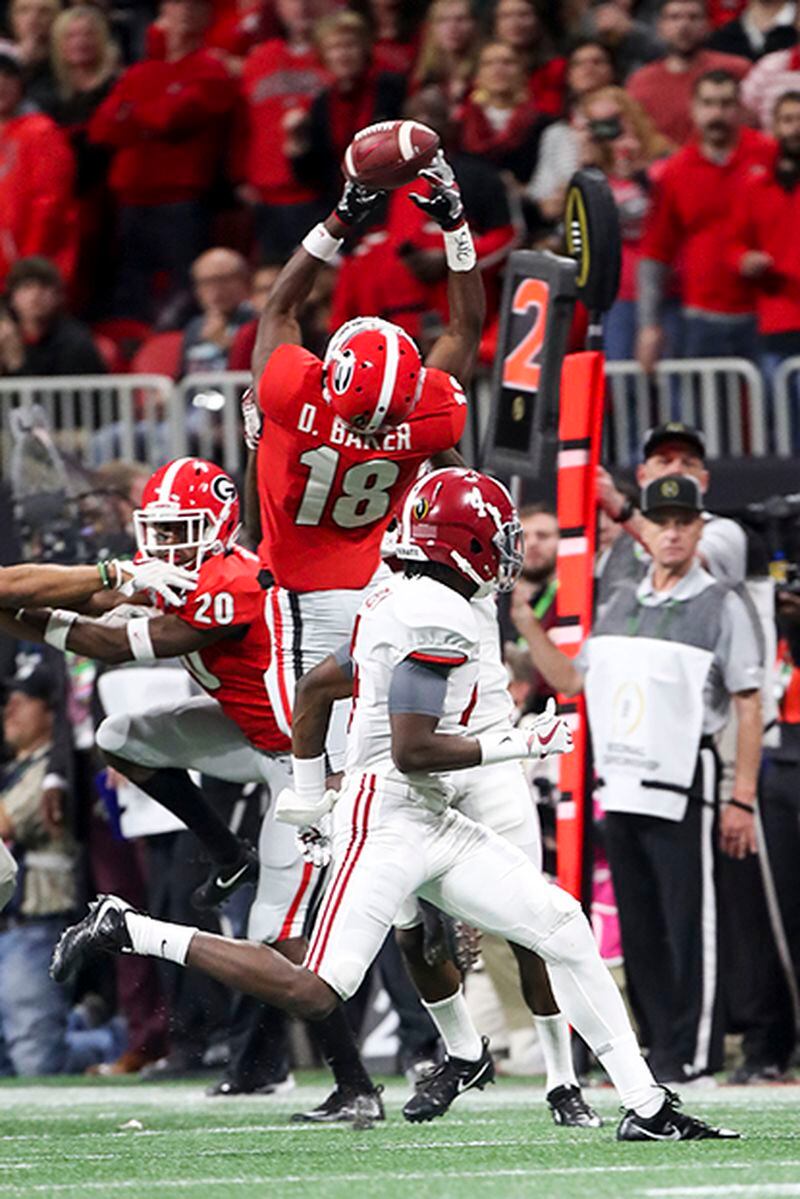 Georgia Bulldogs defensive back Deandre Baker (18) intercepts the football during the second half of the College Football Playoff National Championship Monday, Jan. 8, 2018, at Mercedes-Benz stadium in Atlanta.