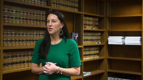 Prosecutor Cara Convery talks a reporter on Friday, August 5, 2022, in the State Law Building in Atlanta. Convery, the AG's gang unit section chief, discussed how she plans to tackle gangs in the state. CHRISTINA MATACOTTA FOR THE ATLANTA JOURNAL-CONSTITUTION
