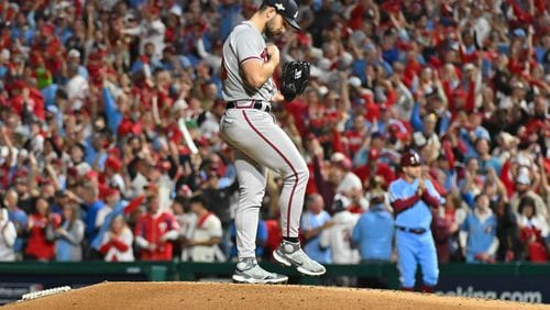 Braves starting pitcher Spencer Strider brushes off the pitching mound after giving up a solo home run to Philadelphia Phillies’ Trea Turner during the fifth inning of NLDS Game 4 at Citizens Bank Park in Philadelphia on Thursday, Oct. 12, 2023.   (Hyosub Shin / Hyosub.Shin@ajc.com)
