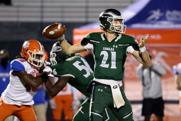 Dec. 11, 2020 - Suwanee, Ga: Collins Hill quarterback Sam Horn (21) attempts a pass against Parkview in the first half of the Class AAAAAAA quarterfinals game at Collins Hill high school Friday, December 11, 2020 in Suwanee, Ga.. JASON GETZ FOR THE ATLANTA JOURNAL-CONSTITUTION