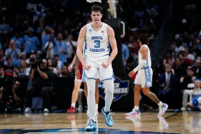 North Carolina guard Cormac Ryan (3) celebrates after scoring during the first half of a Sweet 16 college basketball game against Alabama in the NCAA tournament Thursday, March 28, 2024, in Los Angeles. (AP Photo/Ashley Landis)