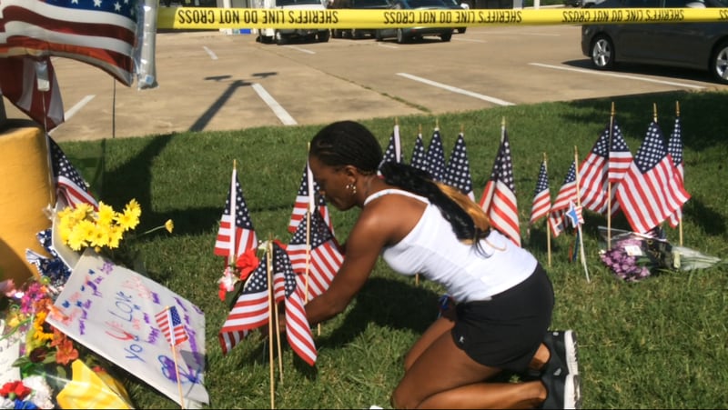 US Army veteran Diondra Pointer pays her respects. Photo: Jennifer Brett