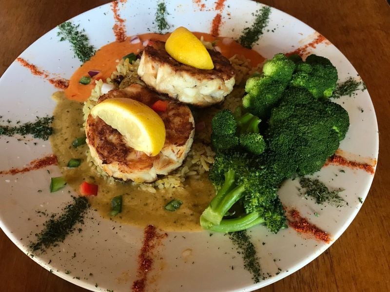 The 100% Lump Crab Cakes at Spondivits contain zero filler. What’s the secret? A little bit of heavy cream, just enough to help moisten and bind it, before setting the mix into ring molds. LIGAYA FIGUERAS / LFIGUERAS@AJC.COM