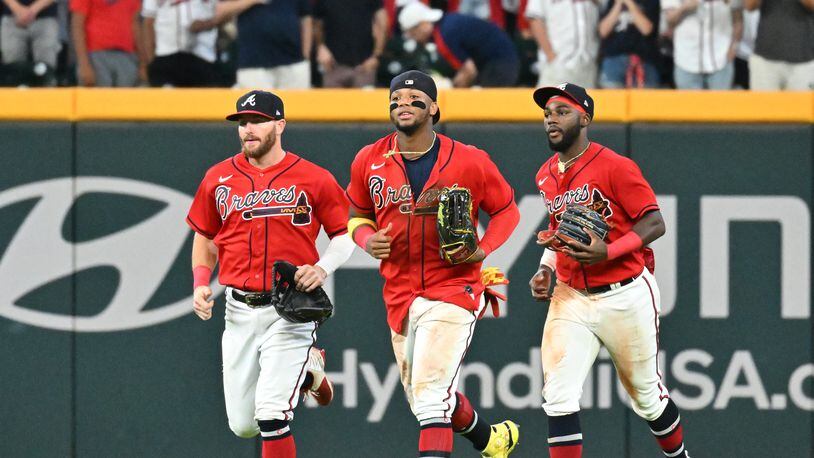 The Braves have received solid production throughout their lineup this season. Robbie Grossman (from left), Ronald Acuña and Michael Harris have filled their roles nicely. (Hyosub Shin / Hyosub.Shin@ajc.com)