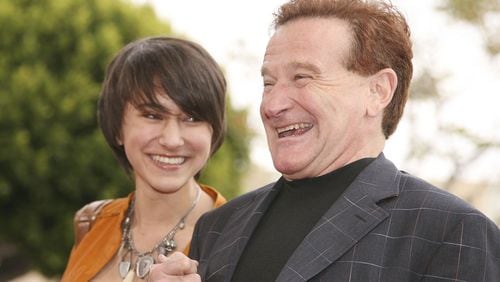 Actor Robin Williams (R) and daughter Zelda pose at the premiere of Columbia Picture's 'RV' at the Village Theater on April 23, 2006 in Los Angeles, California. (Photo by Kevin Winter/Getty Images)