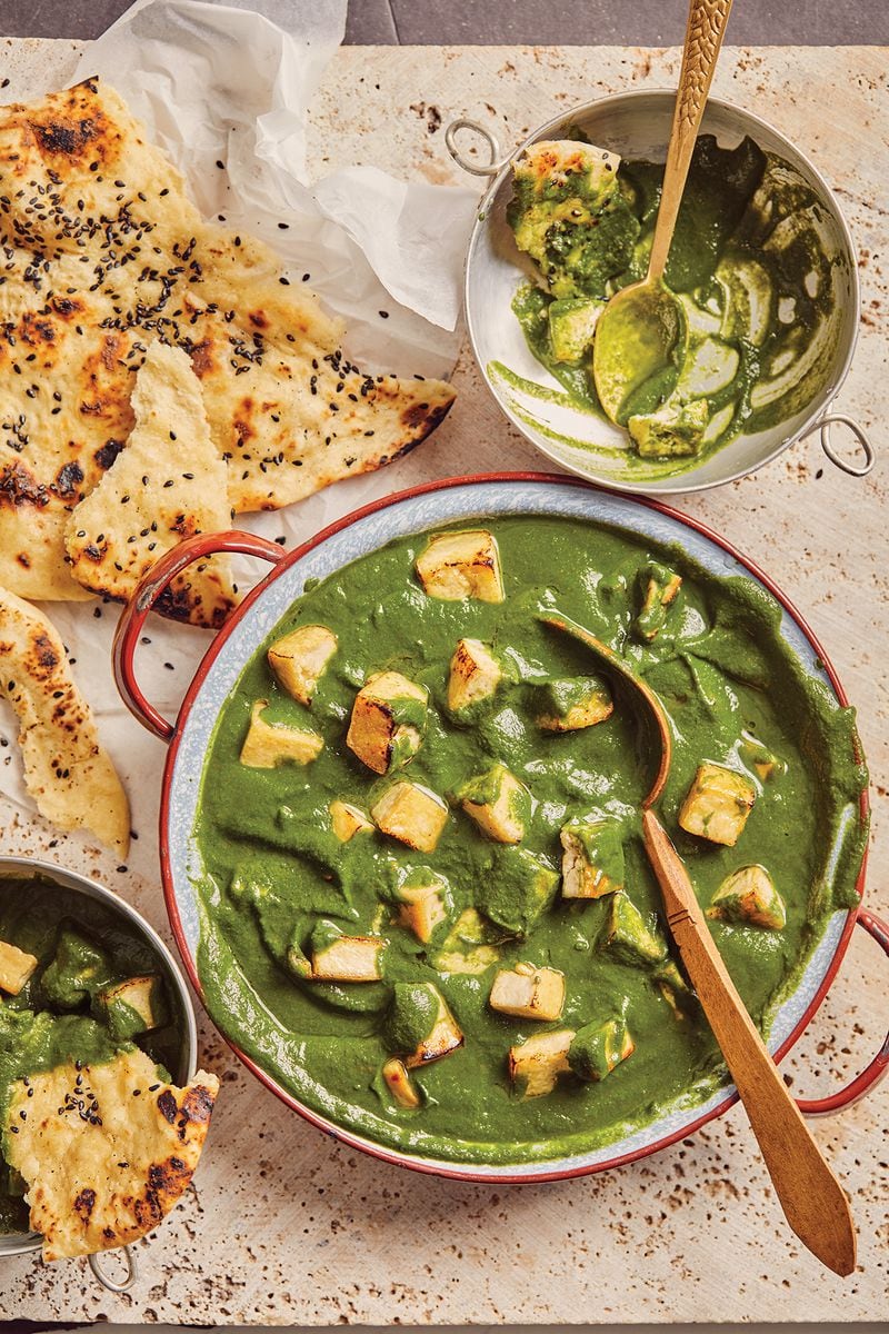 Cookbook author Palak Patel substitutes tofu for dairy-based cheese for a vegan rendition of Palak Paneer.
(Courtesy of Adam Milliron)