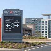 A Gas South District signs is shown in front of the Westin Atlanta Gwinnett Hotel, Thursday, March 14, 2024, in Duluth, Ga. The Westin Atlanta Gwinnett hotel will feature over 27,000-square-feet of space and will be directly attached to the recently expanded Gas South Convention Center and next to Gas South Arena. (Jason Getz / jason.getz@ajc.com)