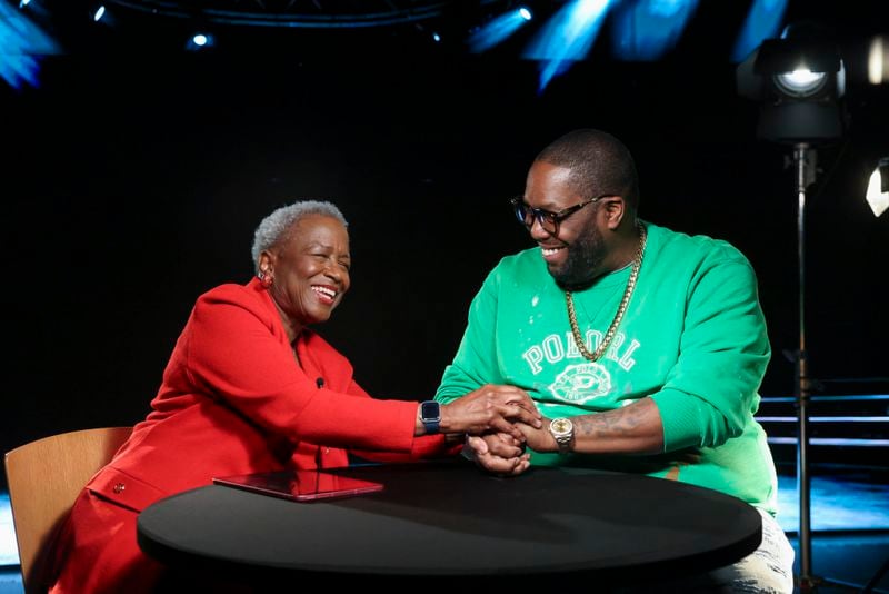 Monica Pearson speaks with Killer Mike during the AJC show, filmed, Friday, December 15, 2023, in Atlanta. Her celebrity interview show on the AJC will be similar to her WSB-TV’s “Monica Close Ups.” Pearson brings five decades of experience to new talk show. (Jason Getz / Jason.Getz@ajc.com)