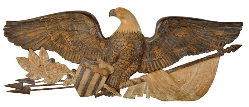 Created by an unidentified artist, this American polychrome carved wood eagle on arrows holds a shield, flag and oak leaves in its talons (circa 20th century), Courtesy of Kenneth Kast