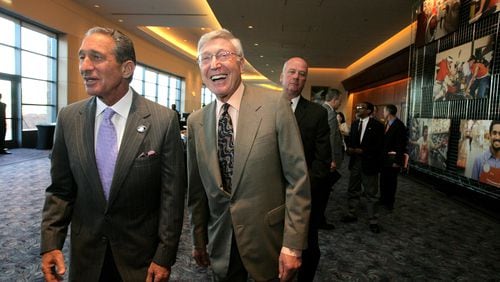 Home Depot co-founders Arthur Blank (L) and Bernie Marcus before the Home Depot annual shareholder meeting in 2007. AJC file