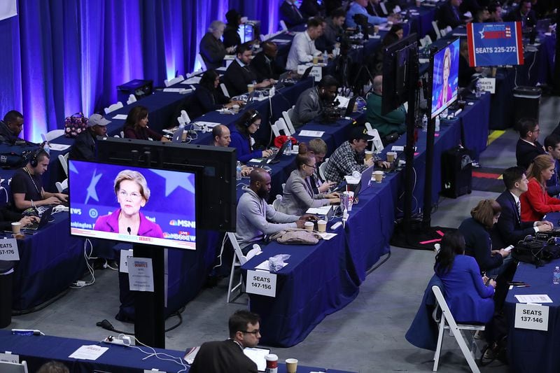 ATLANTA, GEORGIA - NOVEMBER 20: Democratic presidential candidates Sen. Elizabeth Warren (D-MA), is seen being broadcast on television monitors in the media room during the Democratic Presidential Debate at Tyler Perry Studios November 20, 2019 in Atlanta.  (Photo by Joe Raedle/Getty Images)