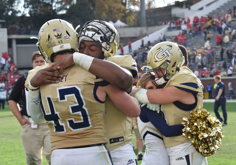 Georgia Tech players react after they lost to Georgia during an NCAA college football game at Bobby Dodd Stadium on Saturday, November 30, 2019. Georgia won 52-7 over the Georgia Tech. (Hyosub Shin / Hyosub.Shin@ajc.com)