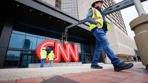  Crew workers were seen removing the iconic CNN sign from the CNN Center downtown on Monday, March 2024. The famous symbol will be refurbished and will find its new home at the Techwood campus by the Warner Brothers studios in Midtown.
Miguel Martinez /miguel.martinezjimenez@ajc.com