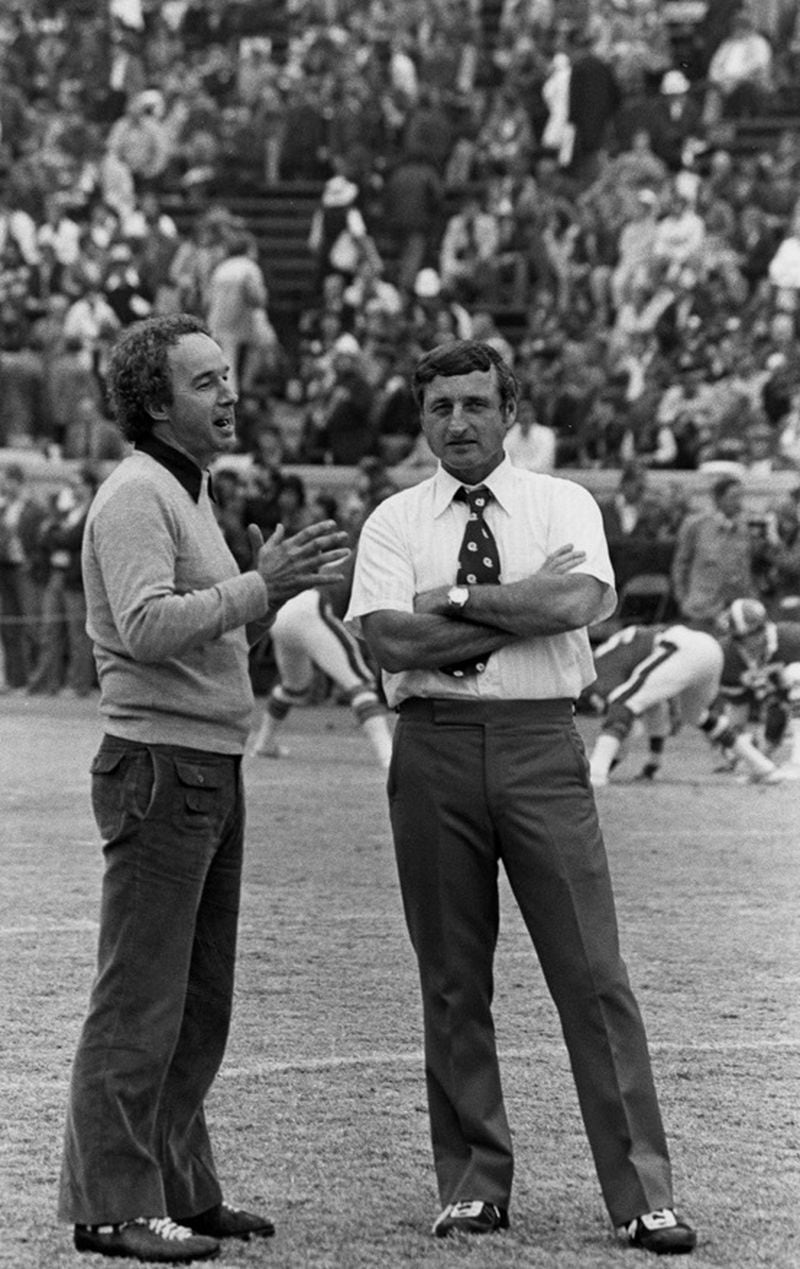 Georgia Tech great Pepper Rodgers with former Georgia coach Vince Dooley in an undated photo, likely prior to a Tech-Georgia game during Rodgers' tenure as head coach at Tech, 1974-79. (Georgia Tech Archives)