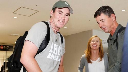 Carter Stewart (left) arrives with his parents at Fukuoka airport in western Japan Saturday, June 1, 2019. The 19-year old pitcher from Florida has signed a six-year contract with the Fukuoka SoftBank Hawks of Japan's Pacific League that will guarantee him as much as $7 million.