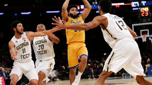 Cal State Bakersfield Justin Pride (51) looks to pass around the Georgia Tech defense during the second half of an NCAA college basketball game in the semifinals of the NIT Tuesday, March 28, 2017, in New York. (AP Photo/Kathy Willens)