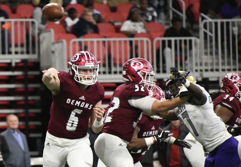 Warner Robins QB Dylan Fromm (6) executes a pass during the Class AAAAAA state championship game Tuesday, Dec., 11, 2018, at Mercedes-Benz Stadium, in Atlanta. 