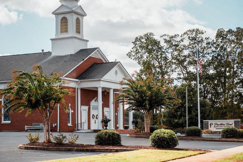 The church campus has grown and now includes the sanctuary, an office space, a Sunday School building, a gymnasium, a fellowship hall, two mission houses, “several” parsonages, a softball field, a cemetery and some storage buildings. (Courtesy of Peachtree Road Baptist Church)