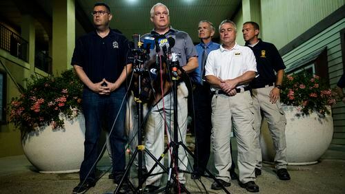Matthew Weintraub, District Attorney for Bucks County, Pa., speaks with members of the media in New Hope, Pa., Thursday, July 13, 2017. Authorities said they've found human remains in their search for four missing young Pennsylvania men and they can now identify one victim. (AP Photo/Matt Rourke)