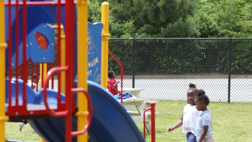 Children play on the playground at Dobbs Elementary School in Atlanta on Wednesday, May 1, 2019. Atlanta Public Schools closed playgrounds in the spring amid the pandemic but plans to reopen them. EMILY HANEY / AJC FILE PHOTO