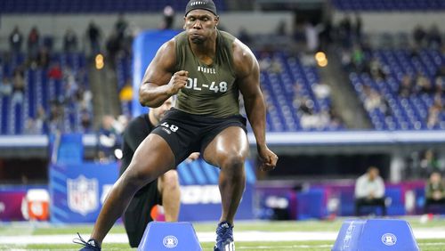 Georgia Tech defensive lineman Keion White runs a drill at the NFL football scouting combine in Indianapolis, Thursday, March 2, 2023. (AP Photo/Michael Conroy)