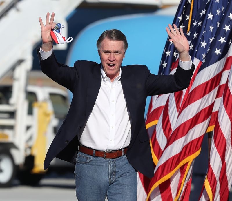 Former Sen. David Perdue, who is running in the GOP primary to unseat Republican Gov. Brian Kemp, has hired several people who worked for Kemp's successful campaign for governor in 2018. (Curtis Compton/Atlanta Journal-Constitution/TNS)