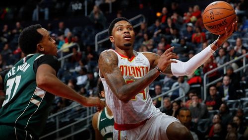 Kent Bazemore  of the Atlanta Hawks drives against John Hensonof the Milwaukee Bucks at Philips Arena on October 29, 2017 in Atlanta, Georgia.  (Photo by Kevin C. Cox/Getty Images)