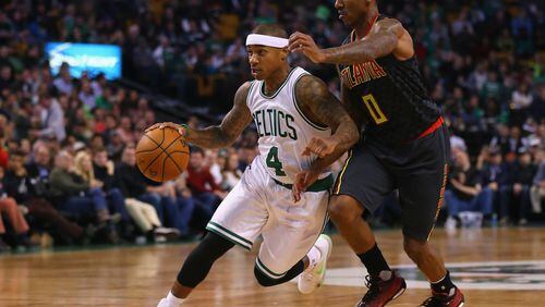 Isaiah Thomas (4) of the Boston Celtics drives against Jeff Teague (0) of the Atlanta Hawks during the second quarter at TD Garden on November 13, 2015 in Boston, Massachusetts. (Photo by Maddie Meyer/Getty Images)