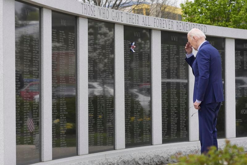 President Joe Biden visits the War Memorial in Scranton, Pa., Wednesday, April 17, 2024. Biden's uncle, Ambrose J Finnegan Jr., who died in WWII, is listed on the wall. (AP Photo/Alex Brandon)