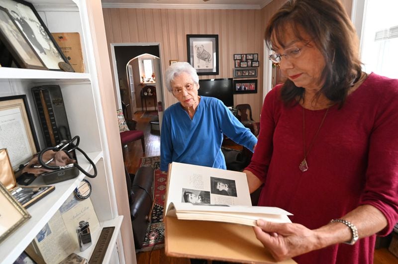 Patricia Goodman and her mother, Ann Bynum, look through memorials of Dr. Job Caldwell Patterson at Goodman's home in Cuthbert. Dr. Patterson lived in this home just a block from the hospital that would later be called Southwest Georgia Regional Medical Center. (Hyosub Shin / Hyosub.Shin@ajc.com)