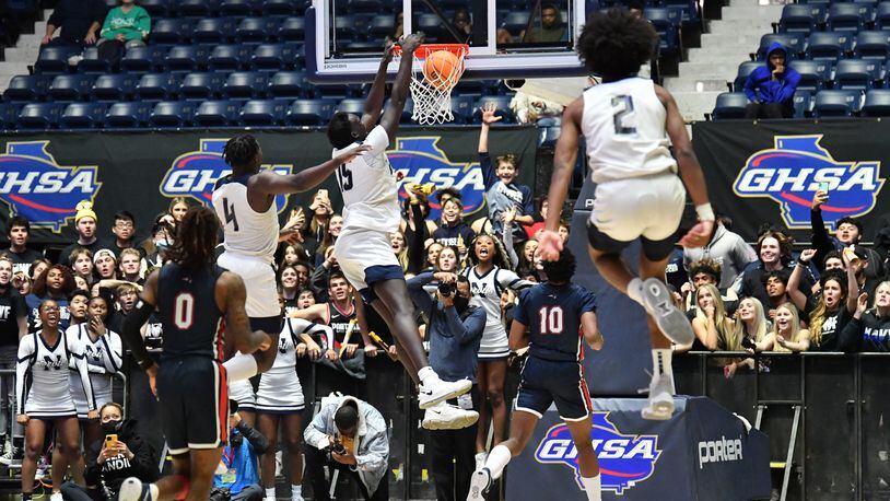 March 12, 2022 Macon - Norcross' Jerry Deng (15) dunks the ball at the end of the 4th quarter during the 2022 GHSA State Basketball Class AAAAAAA Boys Championship game at the Macon Centreplex in Macon on Saturday, March 12, 2022. Norcross won 58-45 over Berkmar. (Hyosub Shin / Hyosub.Shin@ajc.com)