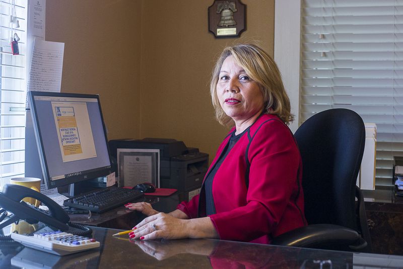 Norma Hernandez, president of the Northeast Georgia Latino Chamber of Commerce, in her office in Gainesville. (Alyssa Pointer/alyssa.pointer@ajc.com)