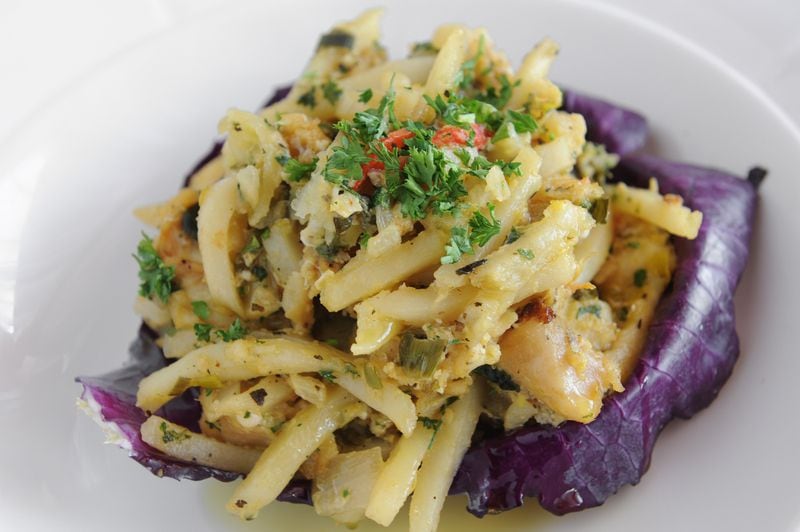 Bacalao a braz- Codfish served on shoe string fries, sauteed onions, garlic, parsley and scrambled egg. (Beckysteinphotography.com)