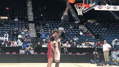 Jeremy Bell of Clinch County soars high in the winning effort at the GSGA Slam Dunk contests at the Macon Coliseum, March 9l 2024.