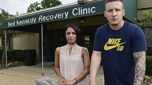 Niki Campana, left, and Paul Wright stand together outside the Neil Kennedy Recovery Clinic, Thursday, June 15, 2017, in Youngstown, Ohio. Republican efforts to roll back âObamacareâ are colliding with the opioid epidemic. Cutbacks would hit hard in states that are deeply affected by the addiction crisis and struggling to turn the corner. The issue is Medicaid, expanded under former President Barack Obama. Data shows that Medicaid expansion is paying for a large share of treatment costs in hard hit states. (AP Photo/David Dermer)