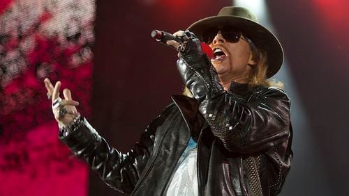 Axl Rose will reunite with Slash and Duff McKagan this summer. (AP Photo/Nousha Salimi, file)