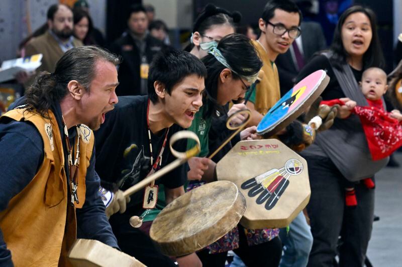 Ida'ina K'eljeshna (Friendship Dancers) from the Upper Cook Intet performed at the beginning of the Native Youth Olympics Senior Games in the Alaska Airlines Center, Thursday, April 25, 2024, in Anchorage, Alaska. (Bill Roth/Anchorage Daily News via AP)